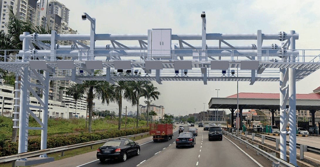 Free-flow tolling gantry with ANPR cameras and RFID readers over a highway